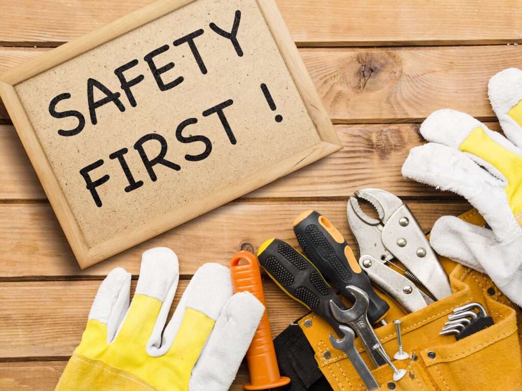 safety-first-sign-tools-arrangement